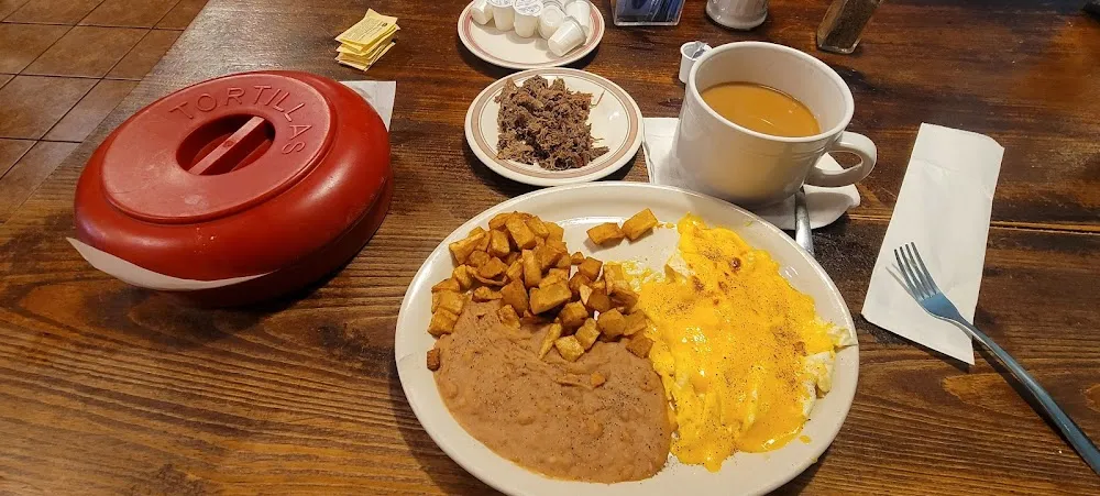 Anita's Breakfast Special Plus a Side of Barbacoa